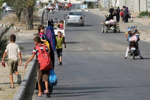 Palestinos huyen de sus casas después de ultimátum de Israel. Foto: EFE.